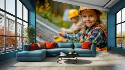 Young children help install solar panels at home. Safe alternative energy, resource saving and sustainable lifestyle concept. Wall mural