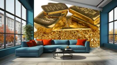 A pile of gold bars and gold granules isolated on white background. Selective focus. Wall mural