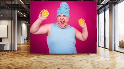 Funny fat man on a diet with oranges. Retro style. Wall mural