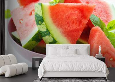 Triangular slices of watermelon with mint on white wooden backgr Wall mural