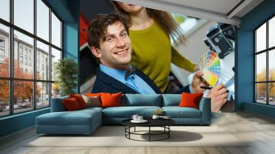 Young colleague - man and woman working from home - modern busin Wall mural