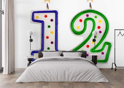 Birthday candles number twelve isolated on white background Wall mural