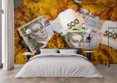 Autumn leaves and money as a symbol of profit Wall mural