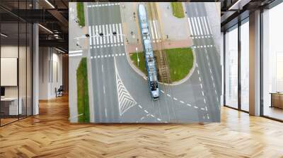 A road in the city with a top view, trams and cars are passing along the road, Poland, Wroclaw Wall mural