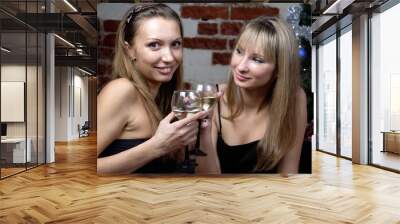 two young women drinking champagne Wall mural