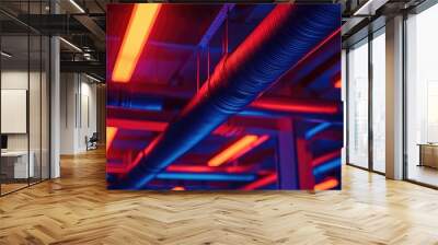 Abstract view of pipes and neon lights in a modern industrial setting Wall mural