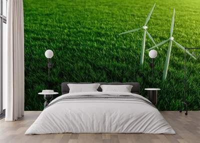 Two wind turbines stand tall in a lush green field, symbolizing clean energy and sustainable technology. Wall mural