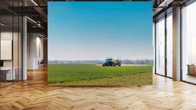 Tractor Spraying Herbicides on Field Agriculture Wall mural