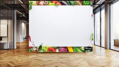 Different colorful vegetables arranged as a frame on white background. Wall mural