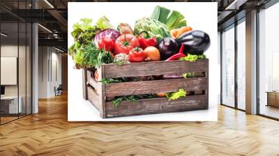 Fresh multi-colored vegetables in wooden crate. Wall mural