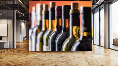 Line of wine bottles. Close-up. Wall mural