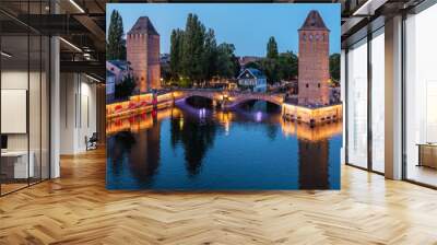 Panoramic view on The Ponts Couverts in evening twilight. Strasbourg with blue cloudy sky. France. Wall mural