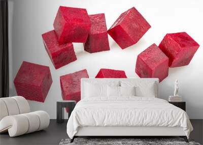 Raw red beetroot cubes isolated on white background. Wall mural