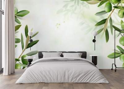 Fresh green olive branches on a bright background Wall mural