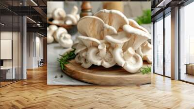 Fresh oyster mushrooms on wooden cutting board in kitchen Wall mural