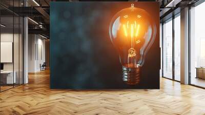 Glowing light bulb on dark background with bokeh effect Wall mural