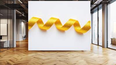 Golden ribbon in wave form on white background Wall mural