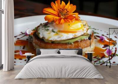 Gourmet breakfast sandwich with a flower garnish on a white plate Wall mural