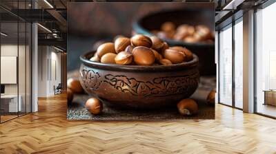 Rustic bowl of fresh brown hazelnuts on textured backdrop Wall mural