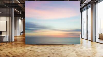 Blurred defocused sunset sky and ocean nature background. Wall mural