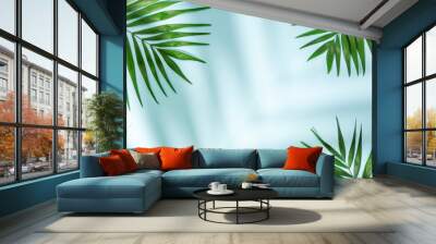 Empty blue background with palm leaves and shadows. Summer tropical backdrop with minimal concept. Wall mural