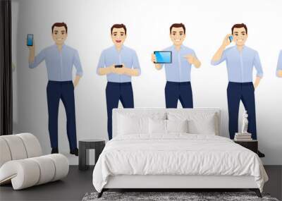 Handsome business young man in blue shirt with gadgets phone and tablet set isolated vector illustration Wall mural