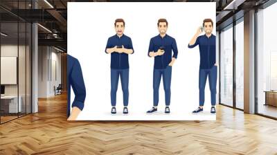 Portrait of young handsome man wearing blue shirt and jeans holding mobile phone, talking, texting and showing empty screen isolated set vector illustration Wall mural