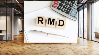 RMD Required Minimum Distribution- Abbreviation for wooden cubes. Business concept Wall mural