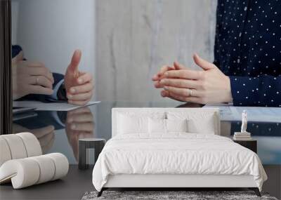 Professional handshake between two professionals and applauds at a corporate meeting with reflection on table over a business meeting. Business people concept Wall mural