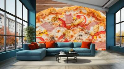 Pepperoni Pizza with Mozzarella cheese, Ham, Tomatoes, pepper, Spices . Italian pizza. Wall mural