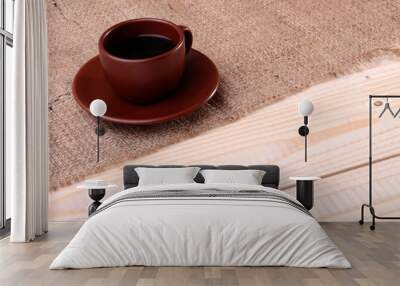 Coffee cup on the table Wall mural