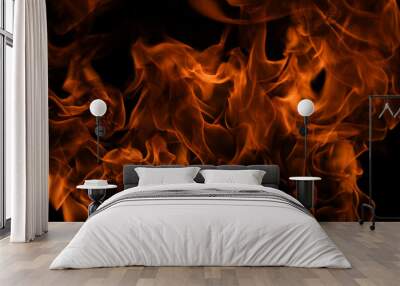 Fire flames isolated on black background. Fire burn flame isolated, flaming burning art design concept with space for text. Wall mural