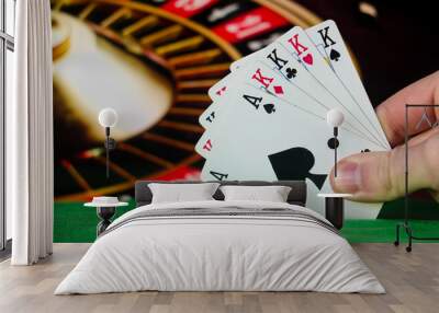 Four of a kind poker cards combination on blurred background casino luck fortune card game Wall mural