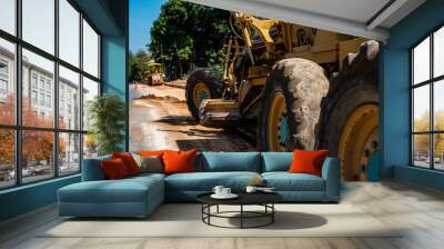 Grader is working on road construction. Grader industrial machine on construction of new roads. Heavy duty machinery working on highway. Construction equipment. Compaction of the road. Wall mural