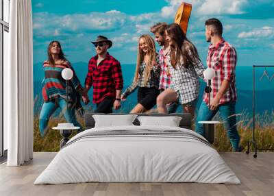 Group of friends tourists, spring banner. Young people on mountain hike. Group of friends go to mountains journey. Group of people friends enjoy outdoor lifestyle activity nature camping. Wall mural