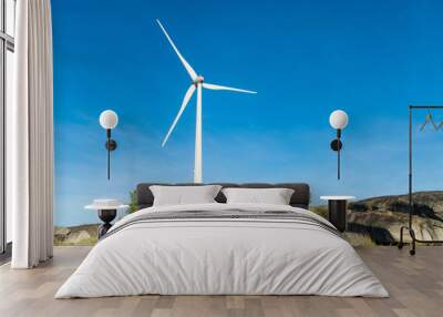 Wind turbines in a rocky mountains in Portugal Wall mural