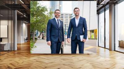 Motivation for business. The partnership between the two business men was successful. Two business mens leadership skills for success. Businessmen stay success. Business mens strategy. Wall mural