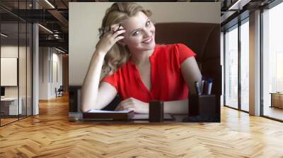 pretty business woman in chair Wall mural