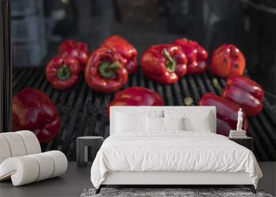 Red sweet peppers cooking on the grill. Healthy vegetarian Meal. Wall mural