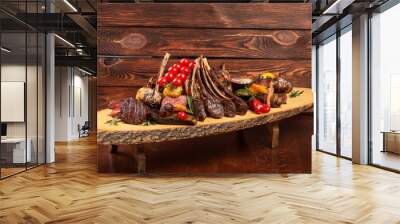 Mixed Grilled meat and vegetables on wooden background Wall mural