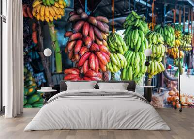 different varieties of bananas in the fruit market Wall mural