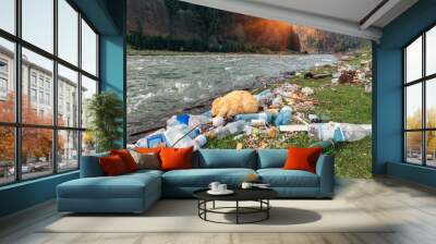 plastic garbage on the river bank Wall mural