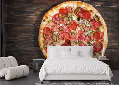 Pepperoni pizza on rustic, vintage style wood background Wall mural