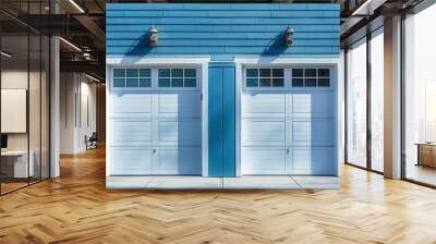 Blue house with two white garage doors and windows Wall mural