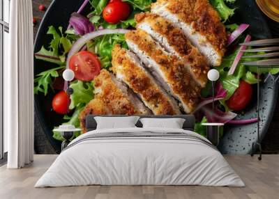 Breaded chicken steak with fresh salad top view Wall mural