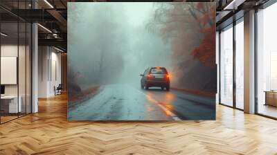 Dangerous winter road traffic in fog car on the road in autumn Wall mural