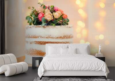 Decorated by flowers white naked cake, rustic style for weddings, birthdays and events. Wall mural