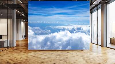 Blue sky with many white clouds background Wall mural