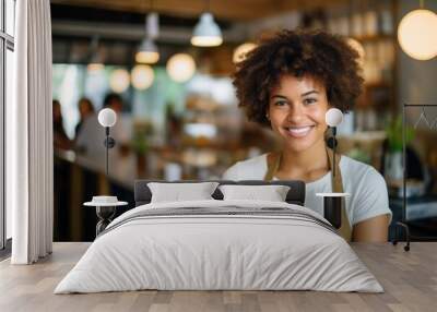 Portrait of a smiling African American female barista Wall mural