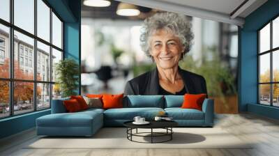 Portrait of a smiling senior African American businesswoman in office Wall mural